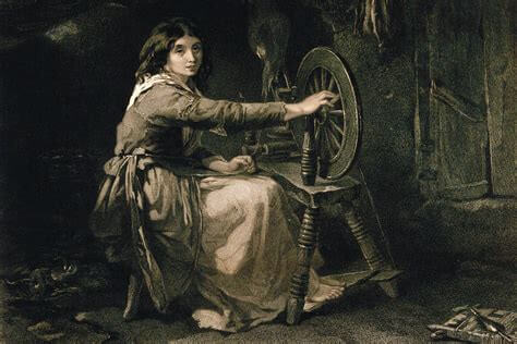 Spinster at a spinning wheel